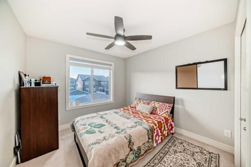 10097 46 Street Ne, Calgary, AB - Indoor Photo Showing Bedroom