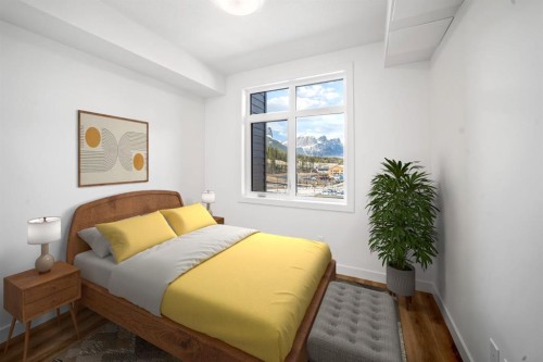 206-10 Cascade Ridge, Canmore, AB - Indoor Photo Showing Bedroom