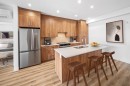 206-10 Cascade Ridge, Canmore, AB  - Indoor Photo Showing Kitchen With Double Sink 