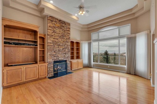 56 Royal Abbey Rise Nw, Calgary, AB - Indoor With Fireplace