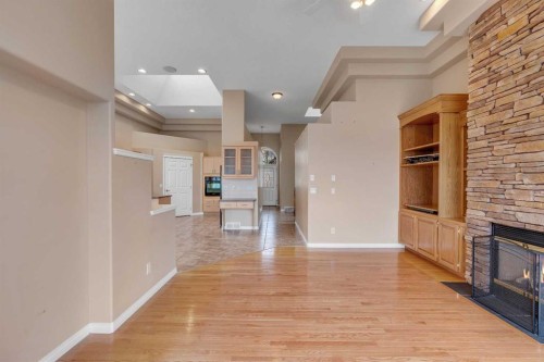 56 Royal Abbey Rise Nw, Calgary, AB - Indoor With Fireplace