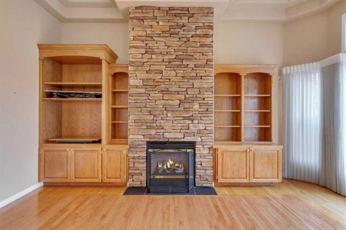 56 Royal Abbey Rise Nw, Calgary, AB - Indoor With Fireplace