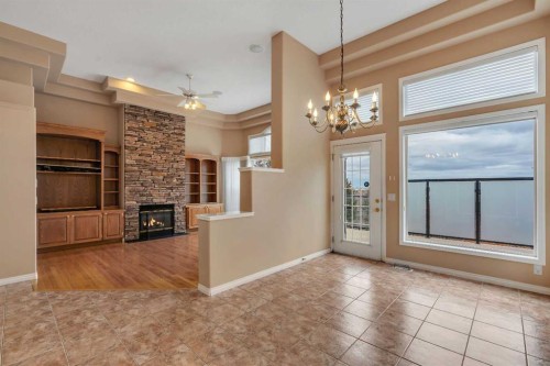 56 Royal Abbey Rise Nw, Calgary, AB - Indoor With Fireplace
