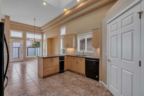 56 Royal Abbey Rise Nw, Calgary, AB - Indoor Photo Showing Kitchen With Double Sink