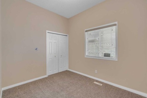 56 Royal Abbey Rise Nw, Calgary, AB - Indoor Photo Showing Other Room