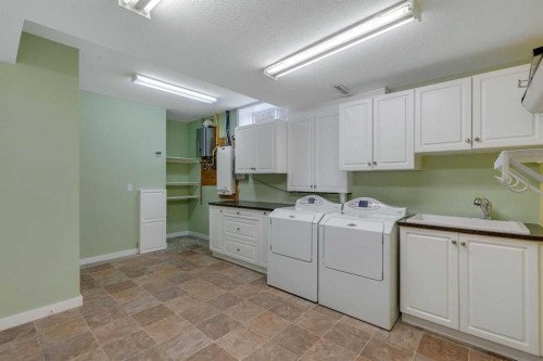 56 Royal Abbey Rise Nw, Calgary, AB - Indoor Photo Showing Laundry Room