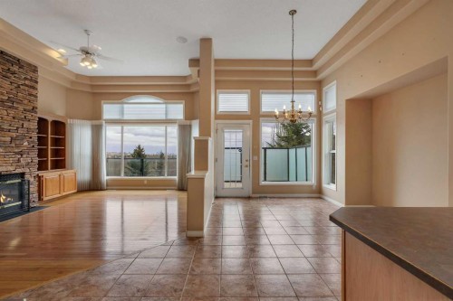 56 Royal Abbey Rise Nw, Calgary, AB - Indoor With Fireplace