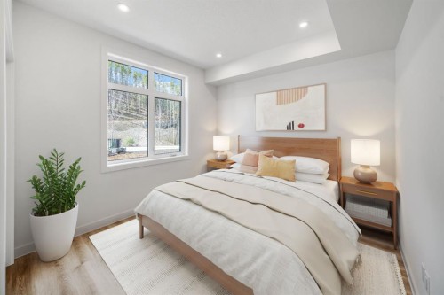 104-10 Cascade Ridge, Canmore, AB - Indoor Photo Showing Bedroom