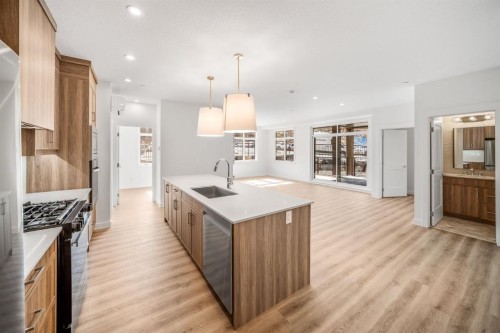 104-10 Cascade Ridge, Canmore, AB - Indoor Photo Showing Kitchen With Upgraded Kitchen