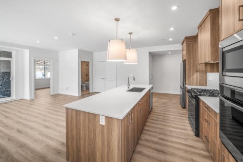 104-10 Cascade Ridge, Canmore, AB - Indoor Photo Showing Kitchen With Upgraded Kitchen