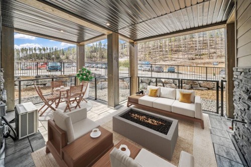 104-10 Cascade Ridge, Canmore, AB - Outdoor With Deck Patio Veranda