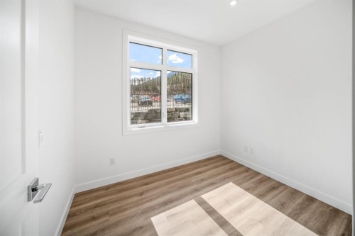 104-10 Cascade Ridge, Canmore, AB - Indoor Photo Showing Other Room