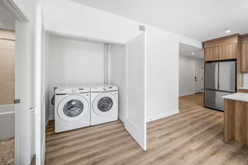 104-10 Cascade Ridge, Canmore, AB - Indoor Photo Showing Laundry Room