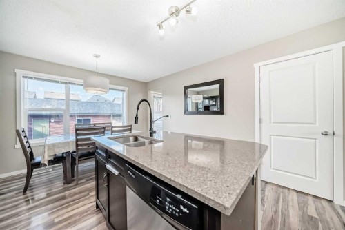 120 Evansridge Court Nw, Calgary, AB - Indoor Photo Showing Kitchen With Double Sink