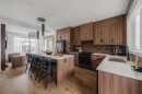 60 Cascade Ridge, Canmore, AB  - Indoor Photo Showing Kitchen With Upgraded Kitchen 