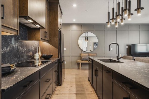 60 Cascade Ridge, Canmore, AB - Indoor Photo Showing Kitchen With Upgraded Kitchen