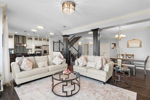 409 Kinniburgh Boulevard, Chestermere, AB - Indoor Photo Showing Living Room