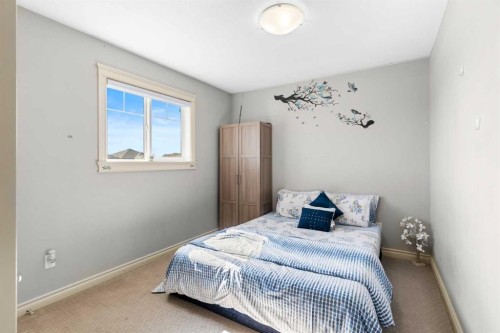 409 Kinniburgh Boulevard, Chestermere, AB - Indoor Photo Showing Bedroom