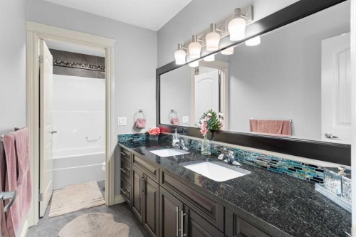 409 Kinniburgh Boulevard, Chestermere, AB - Indoor Photo Showing Bathroom