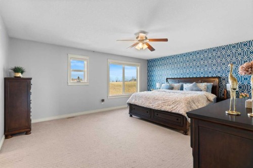 409 Kinniburgh Boulevard, Chestermere, AB - Indoor Photo Showing Bedroom