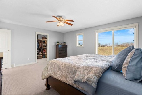 409 Kinniburgh Boulevard, Chestermere, AB - Indoor Photo Showing Bedroom