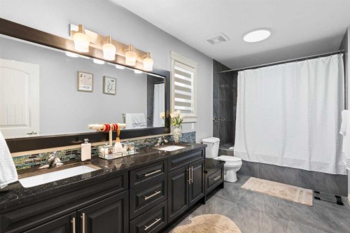 409 Kinniburgh Boulevard, Chestermere, AB - Indoor Photo Showing Bathroom