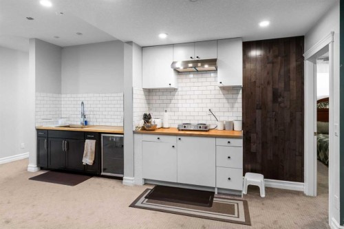409 Kinniburgh Boulevard, Chestermere, AB - Indoor Photo Showing Kitchen With Upgraded Kitchen