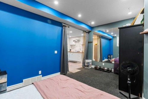 409 Kinniburgh Boulevard, Chestermere, AB - Indoor Photo Showing Bedroom