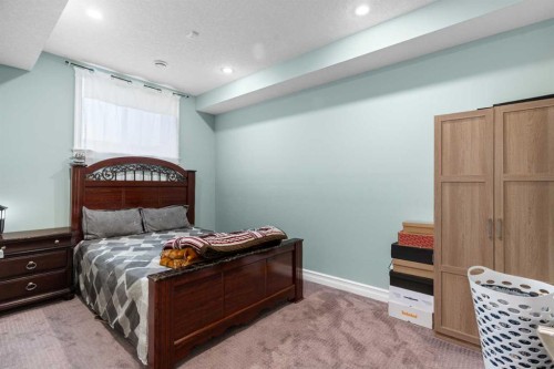 409 Kinniburgh Boulevard, Chestermere, AB - Indoor Photo Showing Bedroom