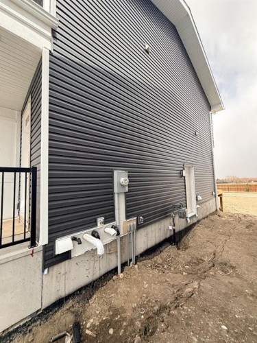1927 Mccaskill Drive, Crossfield, AB - Outdoor With Exterior