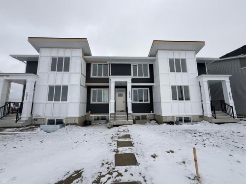 1927 Mccaskill Drive, Crossfield, AB - Outdoor With Facade