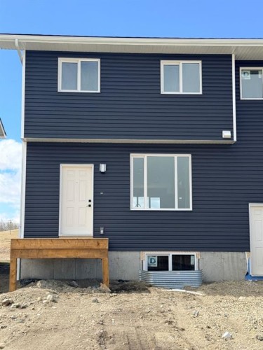 1927 Mccaskill Drive, Crossfield, AB - Outdoor With Exterior