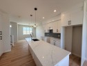 1927 Mccaskill Drive, Crossfield, AB  - Indoor Photo Showing Kitchen With Double Sink 