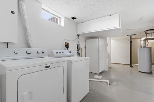 5044 Norris Road Nw, Calgary, AB - Indoor Photo Showing Laundry Room