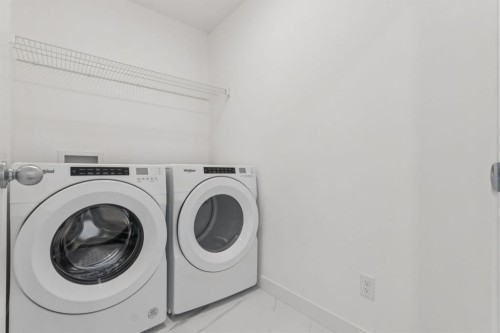 113 Calhoun Common Ne, Calgary, AB - Indoor Photo Showing Laundry Room