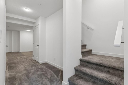 113 Calhoun Common Ne, Calgary, AB - Indoor Photo Showing Other Room