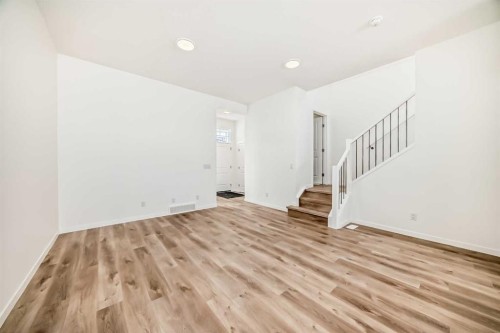 1078 Sawgrass Link Nw, Airdrie, AB - Indoor Photo Showing Other Room