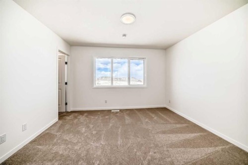 1078 Sawgrass Link Nw, Airdrie, AB - Indoor Photo Showing Other Room