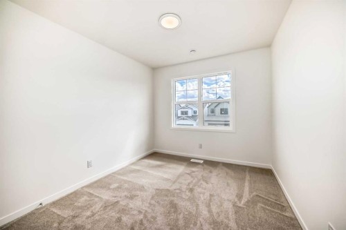 1078 Sawgrass Link Nw, Airdrie, AB - Indoor Photo Showing Other Room