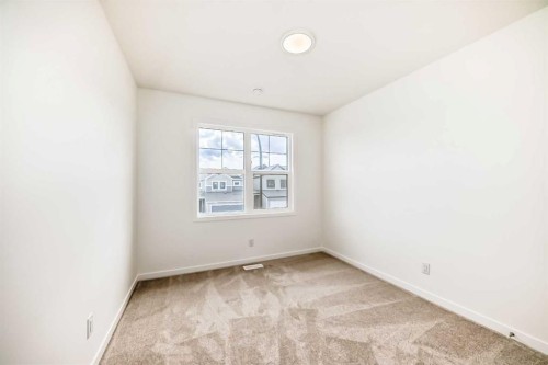 1078 Sawgrass Link Nw, Airdrie, AB - Indoor Photo Showing Other Room