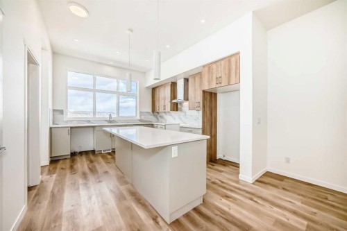 1078 Sawgrass Link Nw, Airdrie, AB - Indoor Photo Showing Kitchen With Upgraded Kitchen