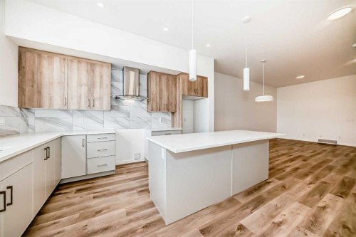 1078 Sawgrass Link Nw, Airdrie, AB - Indoor Photo Showing Kitchen With Upgraded Kitchen