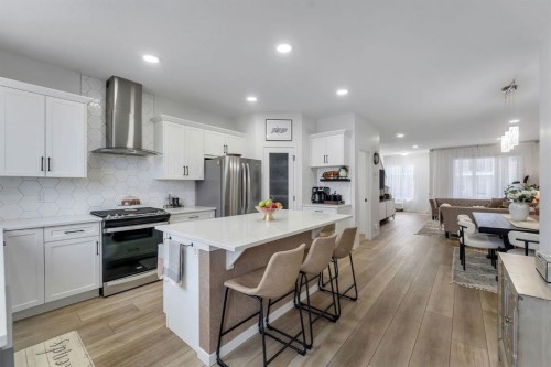 128 Seton Villas Se, Calgary, AB - Indoor Photo Showing Kitchen With Stainless Steel Kitchen With Upgraded Kitchen