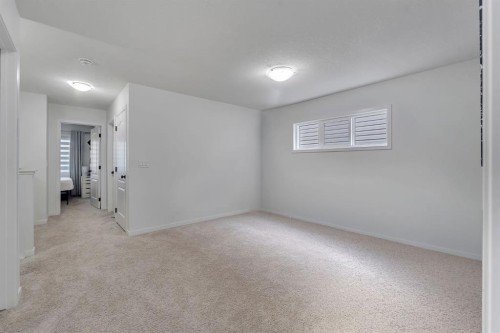 128 Seton Villas Se, Calgary, AB - Indoor Photo Showing Other Room