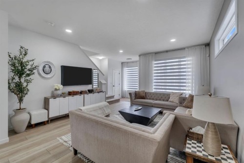 128 Seton Villas Se, Calgary, AB - Indoor Photo Showing Living Room