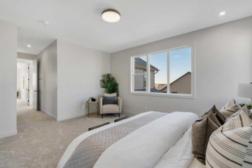 341 Limestone Bay, Balzac, AB - Indoor Photo Showing Bedroom