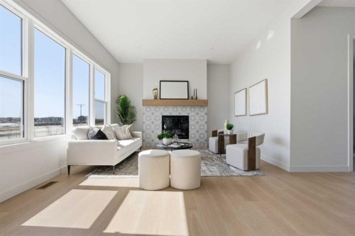 341 Limestone Bay, Balzac, AB - Indoor Photo Showing Living Room With Fireplace