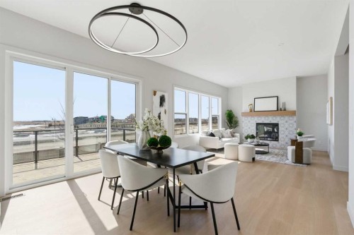 341 Limestone Bay, Balzac, AB - Indoor With Fireplace