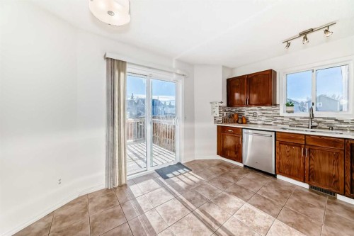 11 Martinridge Place Ne, Calgary, AB - Indoor Photo Showing Kitchen With Double Sink