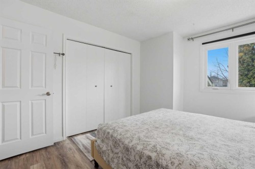 203 Shawglen Road Sw, Calgary, AB - Indoor Photo Showing Bedroom